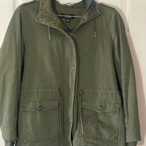 Very warm ! Olive green jacket gently pre owned smoke free home ! Coffee shop